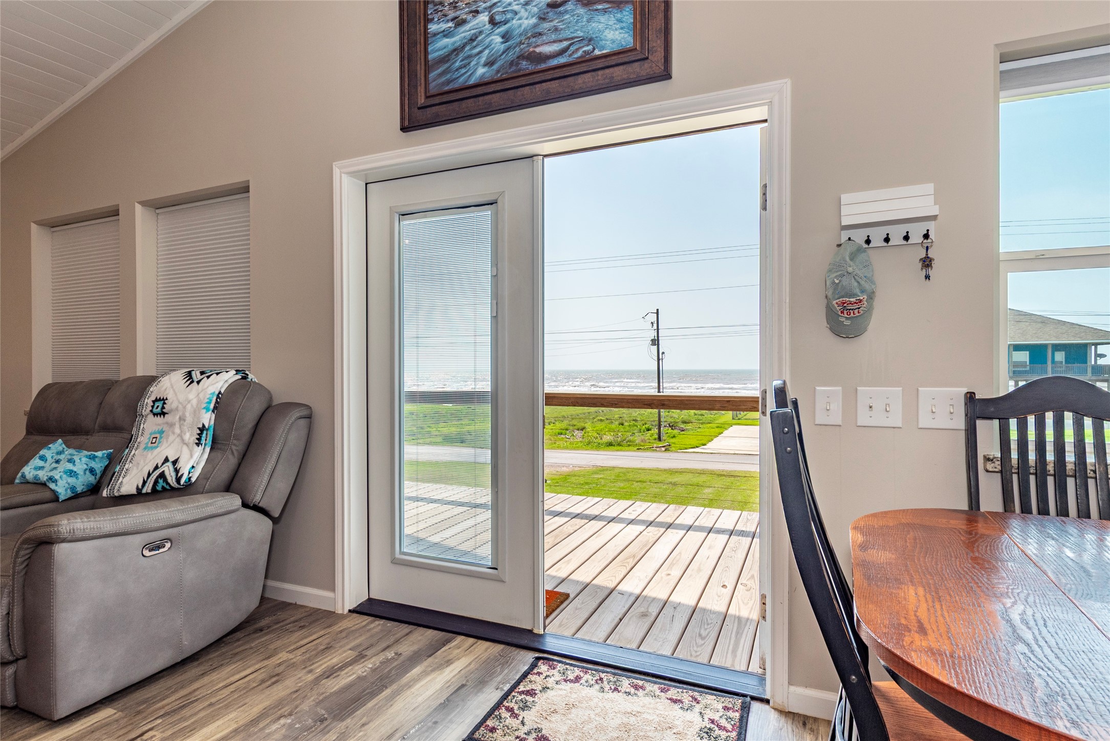 1453 County Road 230 Sargent, TX 77414 - Photo 15 of 30 a living room with furniture and a wooden floor