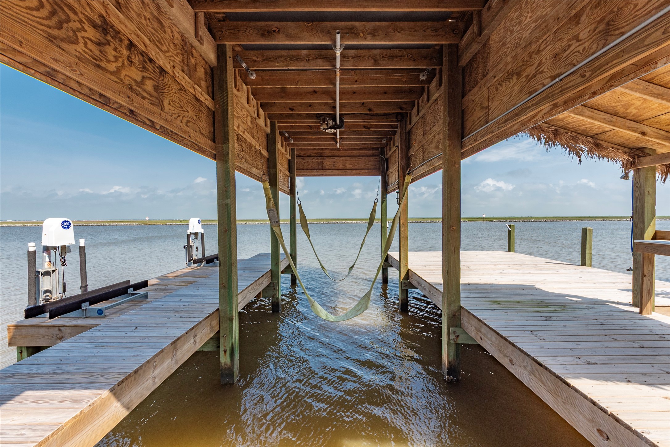 1453 County Road 230 Sargent, TX 77414 - Photo 23 of 30 a view of a living room and a large window