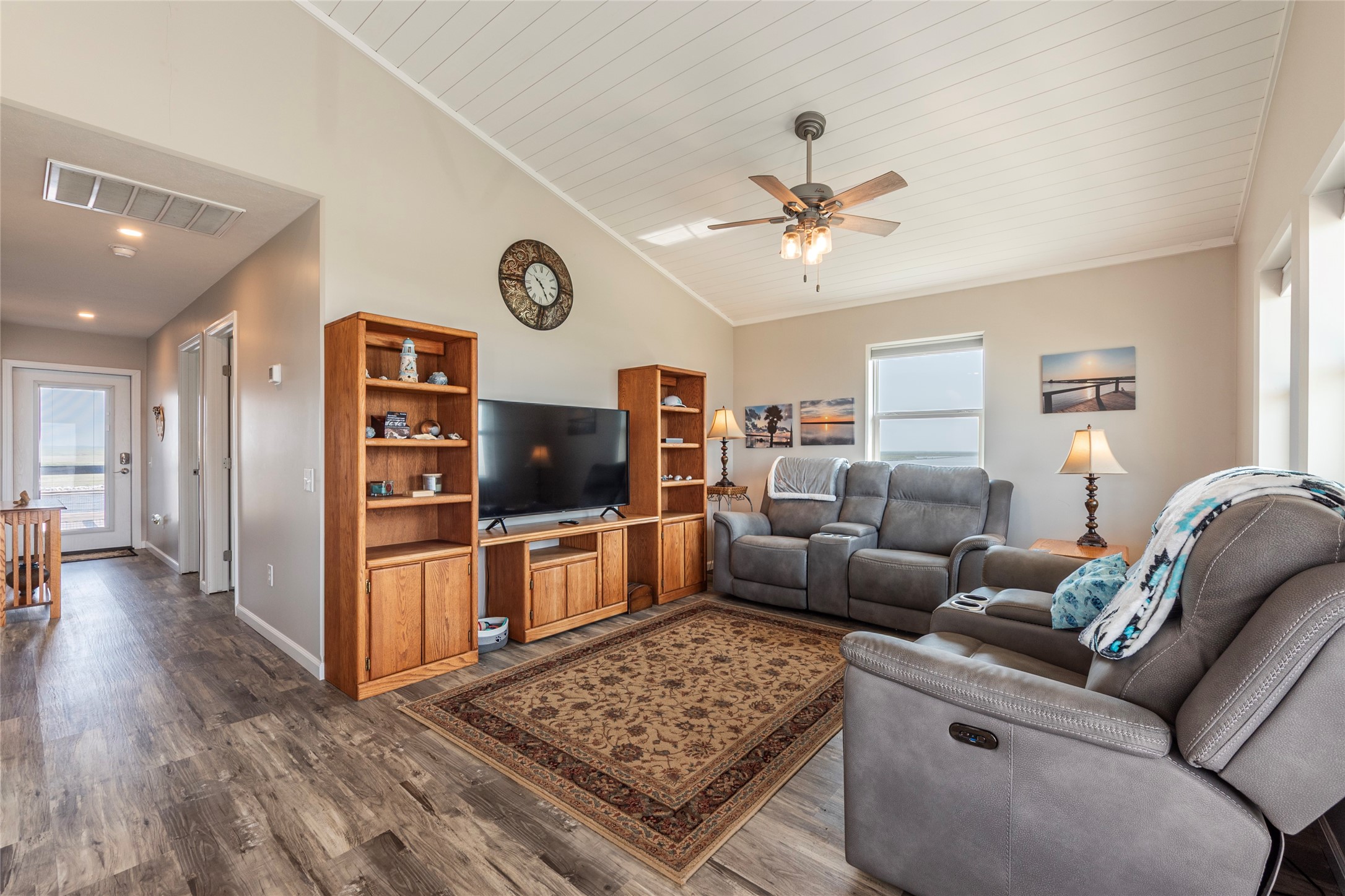1453 County Road 230 Sargent, TX 77414 - Photo 5 of 30 a living room with furniture and a flat screen tv