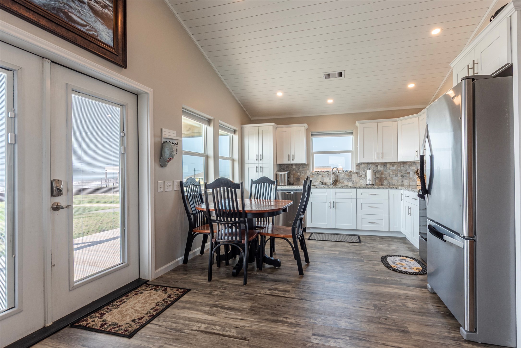 1453 County Road 230 Sargent, TX 77414 - Photo 6 of 30 a view of a dining room with furniture window and wooden floor