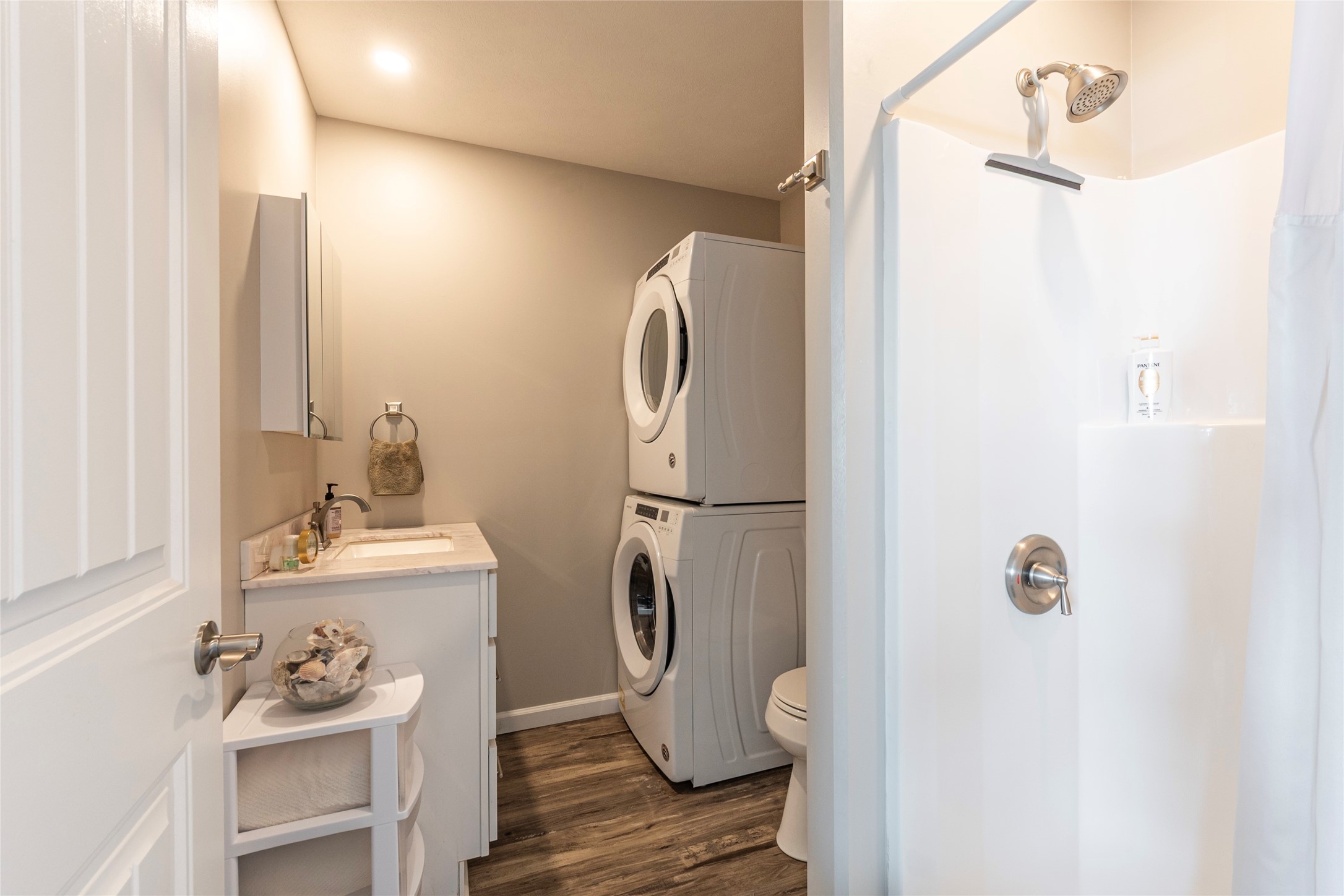 1453 County Road 230 Sargent, TX 77414 - Photo 9 of 30 a bathroom with a sink toilet and shower