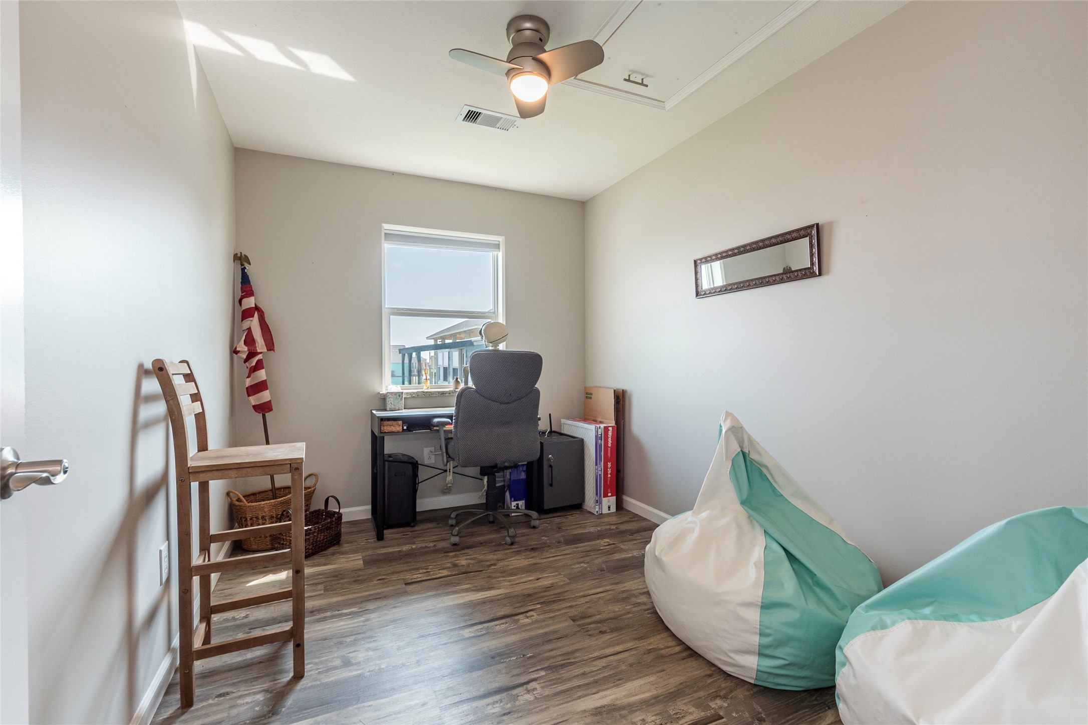 1453 County Road 230 Sargent, TX 77414 - Photo 10 of 30 a living room with furniture and a wooden floor