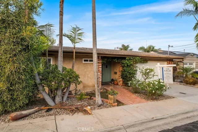 a view of a porch with potted plants