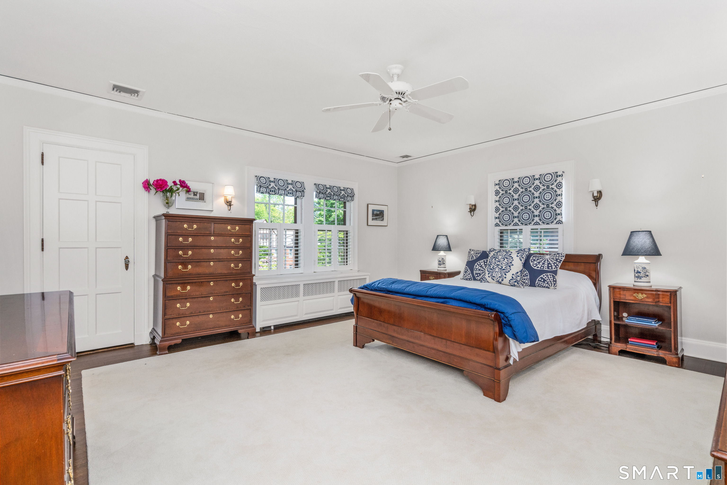 7 Fernwood Road West Hartford, CT 06119 - Photo 18 of 40 a spacious bedroom with a bed and a cabinets