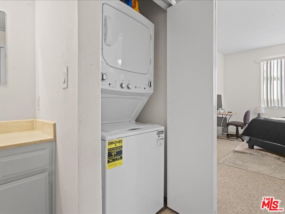 19009 Sherman Way, Unit 2 Reseda, CA 91335 - Photo 17 of 31 a utility room with dryer and washer