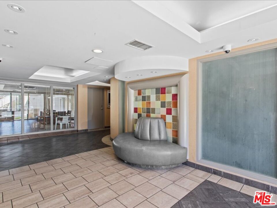 19009 Sherman Way, Unit 2 Reseda, CA 91335 - Photo 24 of 31 a view of a livingroom with furniture