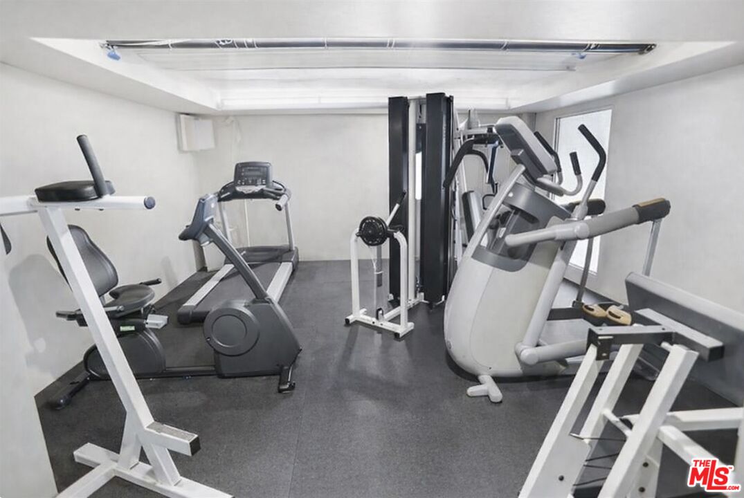 19009 Sherman Way, Unit 2 Reseda, CA 91335 - Photo 28 of 31 a view of a room with gym equipment
