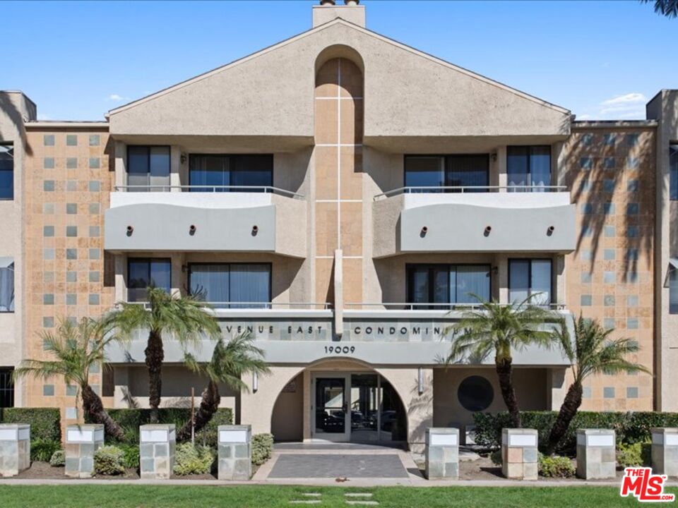 19009 Sherman Way, Unit 2 Reseda, CA 91335 - Photo 3 of 31 a front view of a house with garden