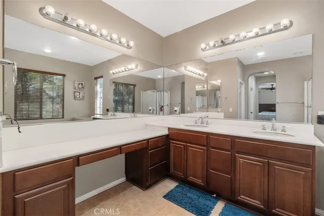 a bathroom with a sink and a large mirror