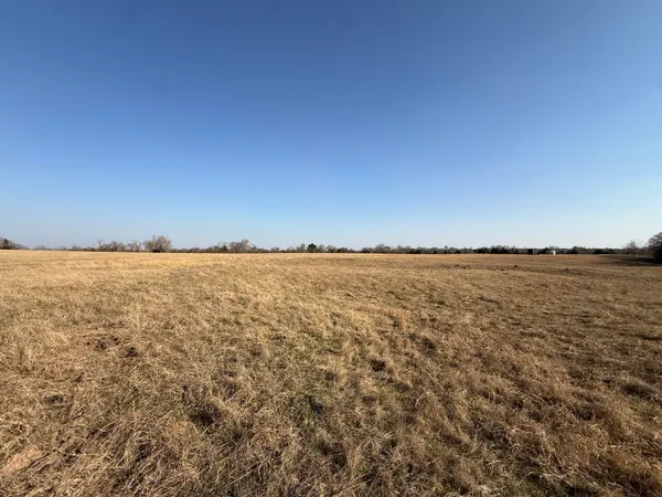 a picture of a bathroom with a sink and a mirror