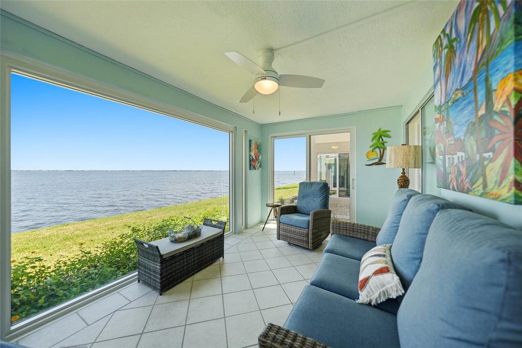 1 Colony Point Drive, Unit A10 Punta Gorda, FL 33950 - Photo 27 of 31 a living room with furniture and a large window