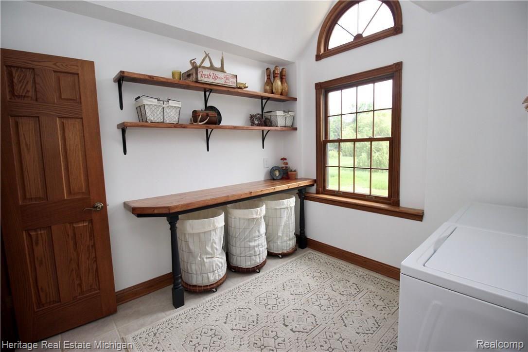 8126 Ruger Ridge Fowlerville, MI 48836 - Photo 33 of 53 Laundry Room