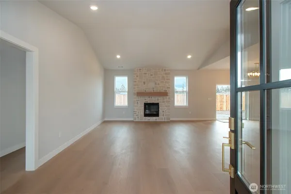 a large living room with a large window