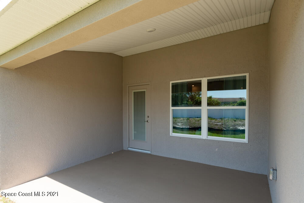 991 Tupelo Circle Cocoa, FL 32926 - Photo 20 of 23 a view of an empty room with a window