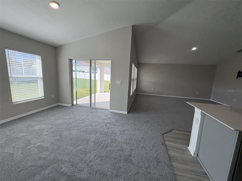13105 Fruitville Way Riverview, FL 33579 - Photo 16 of 56 a view of an empty room with a window