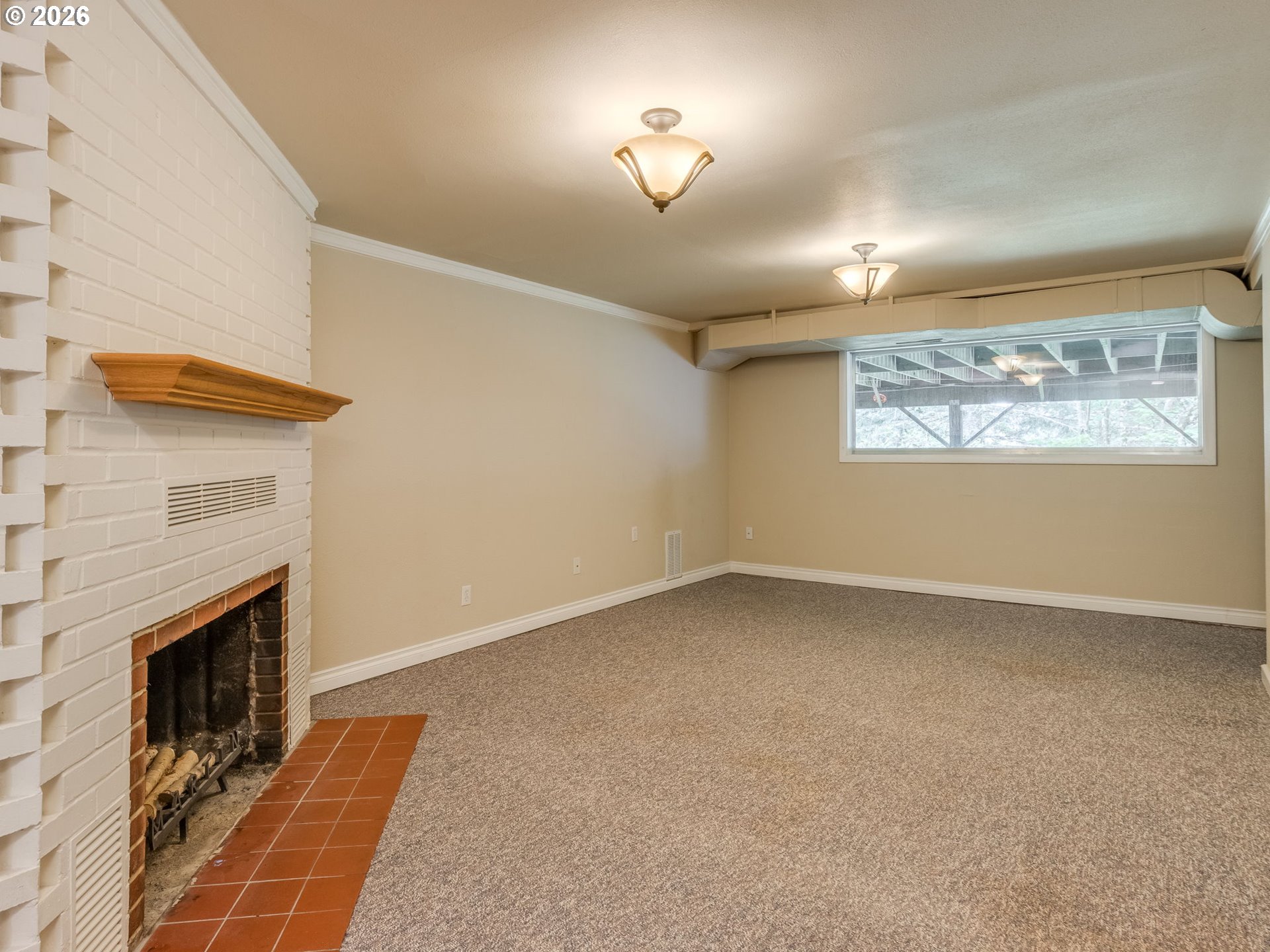 48140 Southeast Linhart Butte Road Sandy, OR 97055 - Photo 33 of 47 a view of an empty room with a fireplace