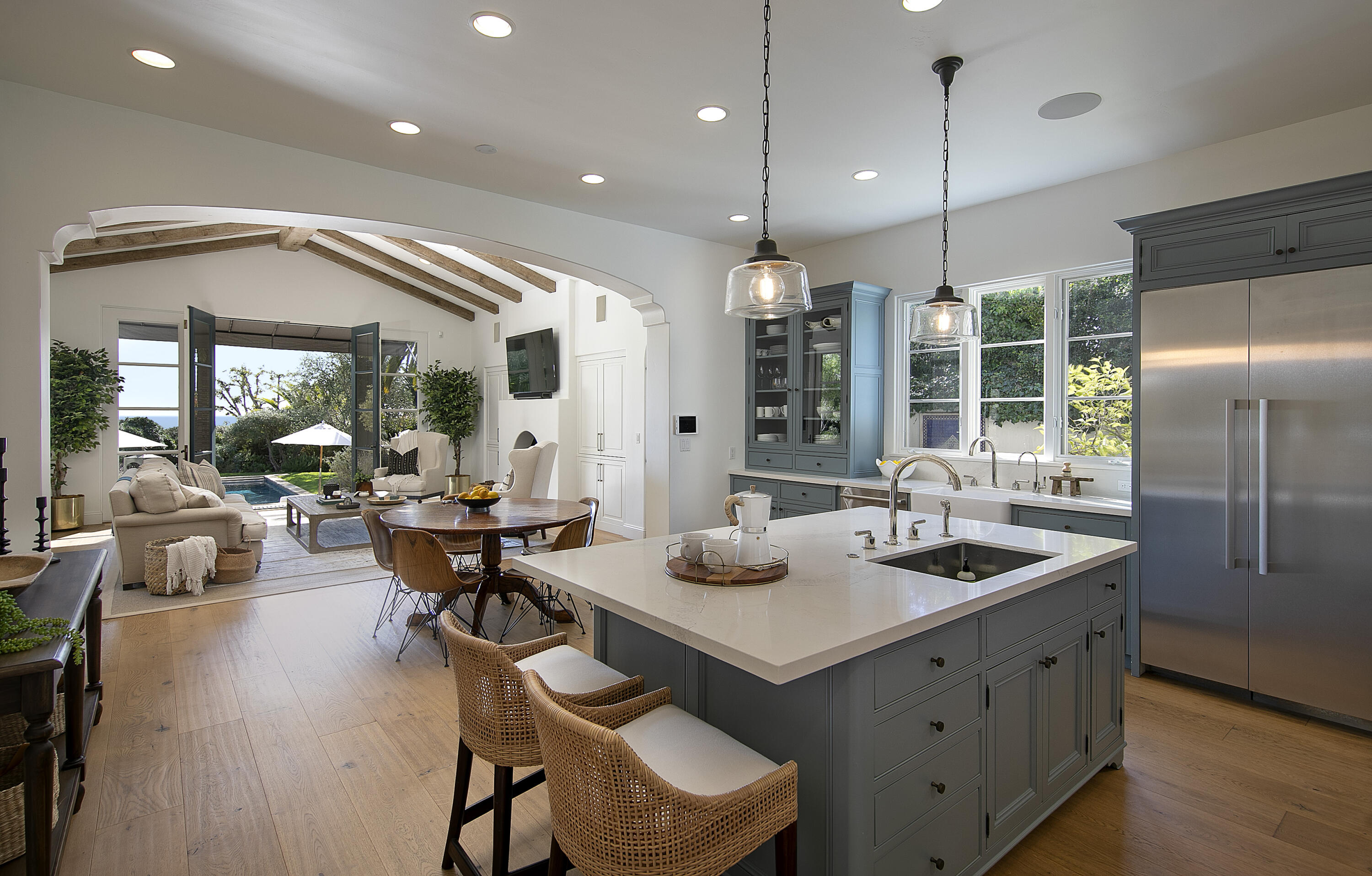 4110 Creciente Drive Santa Barbara, CA 93110 - Photo 12 of 27 a kitchen with sink refrigerator and couches