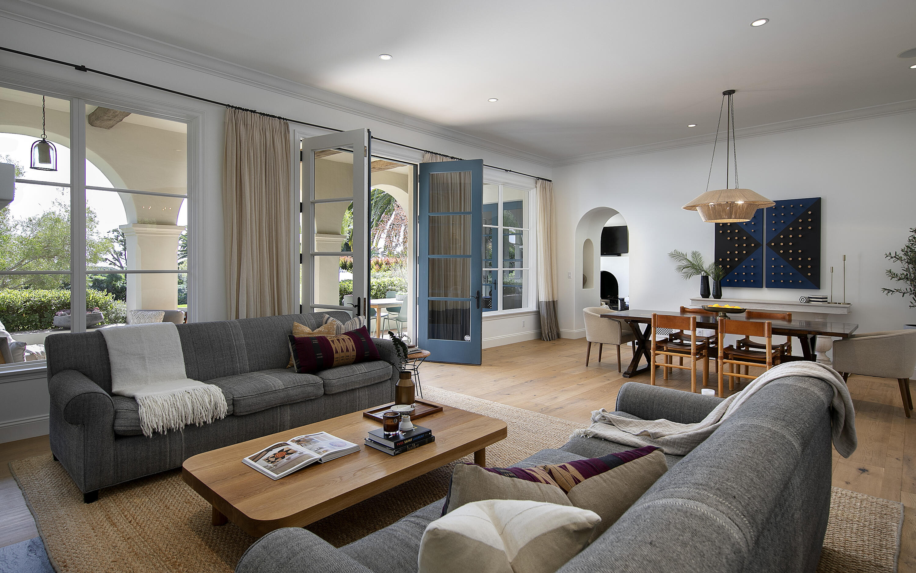 4110 Creciente Drive Santa Barbara, CA 93110 - Photo 7 of 27 a living room with furniture potted plant and a large window