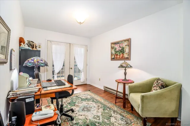 a living room with furniture and a table