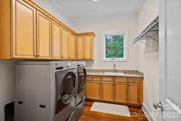 a utility room with dryer and washer
