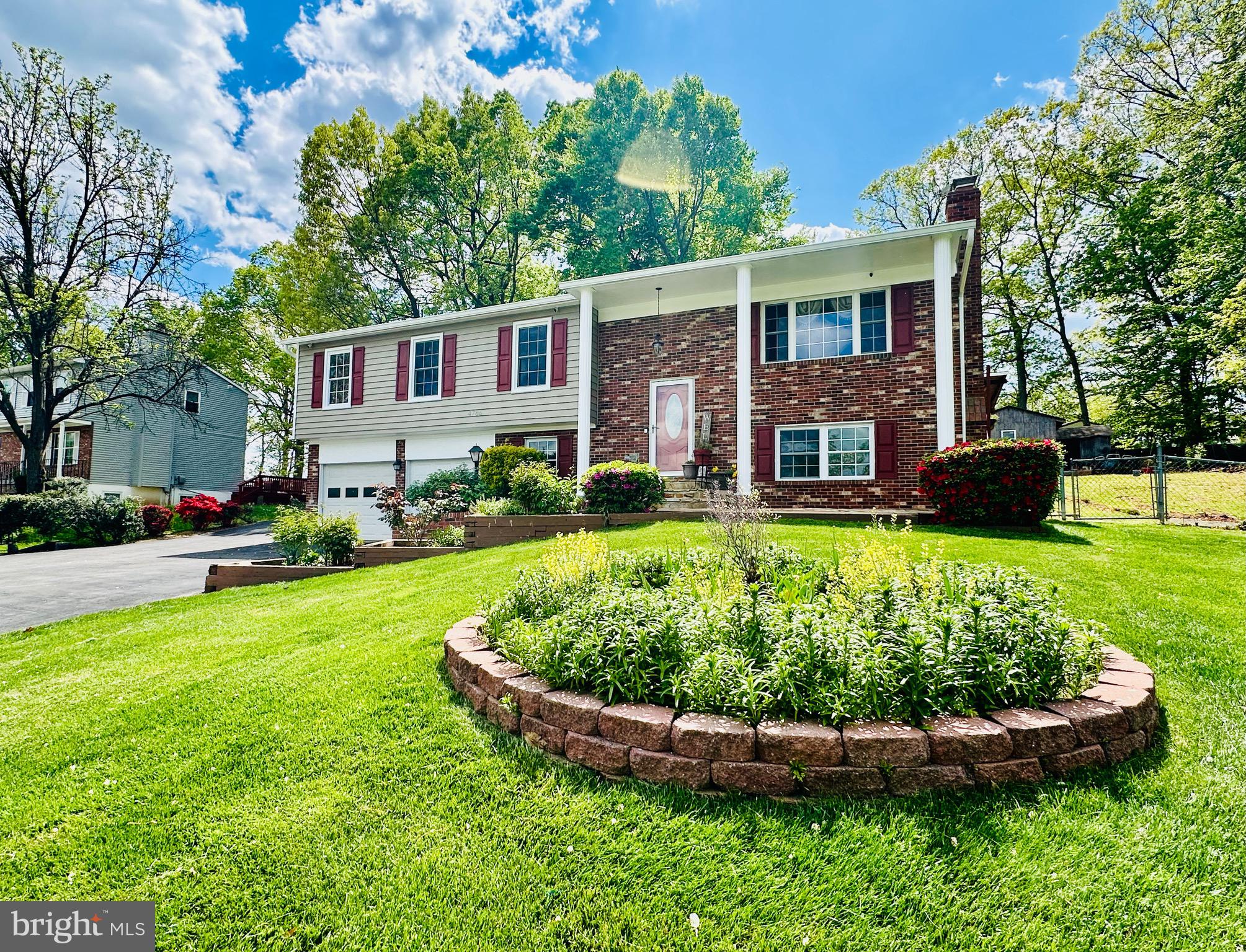 4786 Kelly Road Woodbridge, VA 22193 - Photo 6 of 64 sprinkler system in front of the house