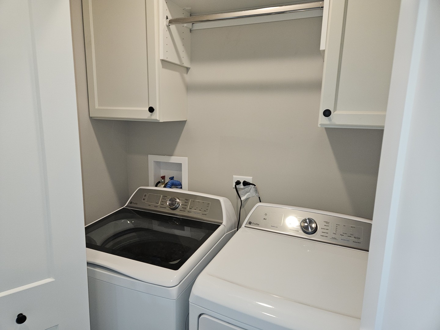 181 Pointe Drive, Unit 181 Northbrook, IL 60062 - Photo 23 of 25 a utility room with dryer and washer