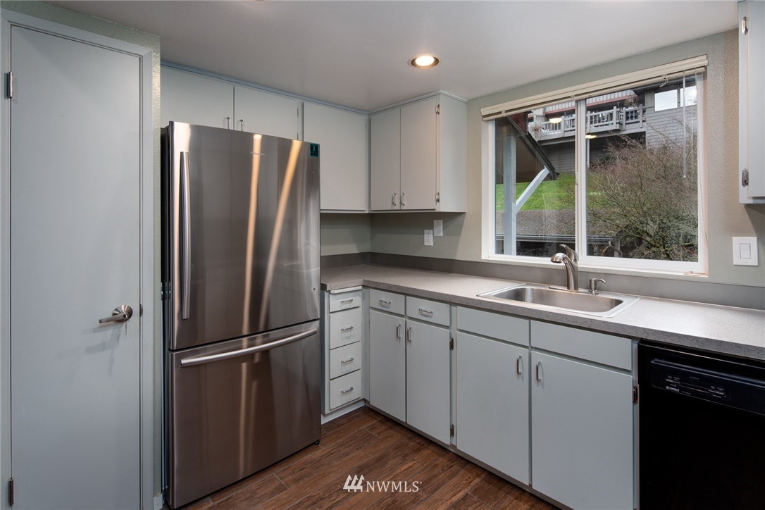 3 Barn View Drive, Unit 5 Bellingham, WA 98229 - Photo 12 of 25 a kitchen with stainless steel appliances a refrigerator sink and window