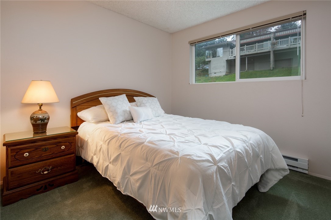 3 Barn View Drive, Unit 5 Bellingham, WA 98229 - Photo 14 of 25 a bedroom with a bed and a window