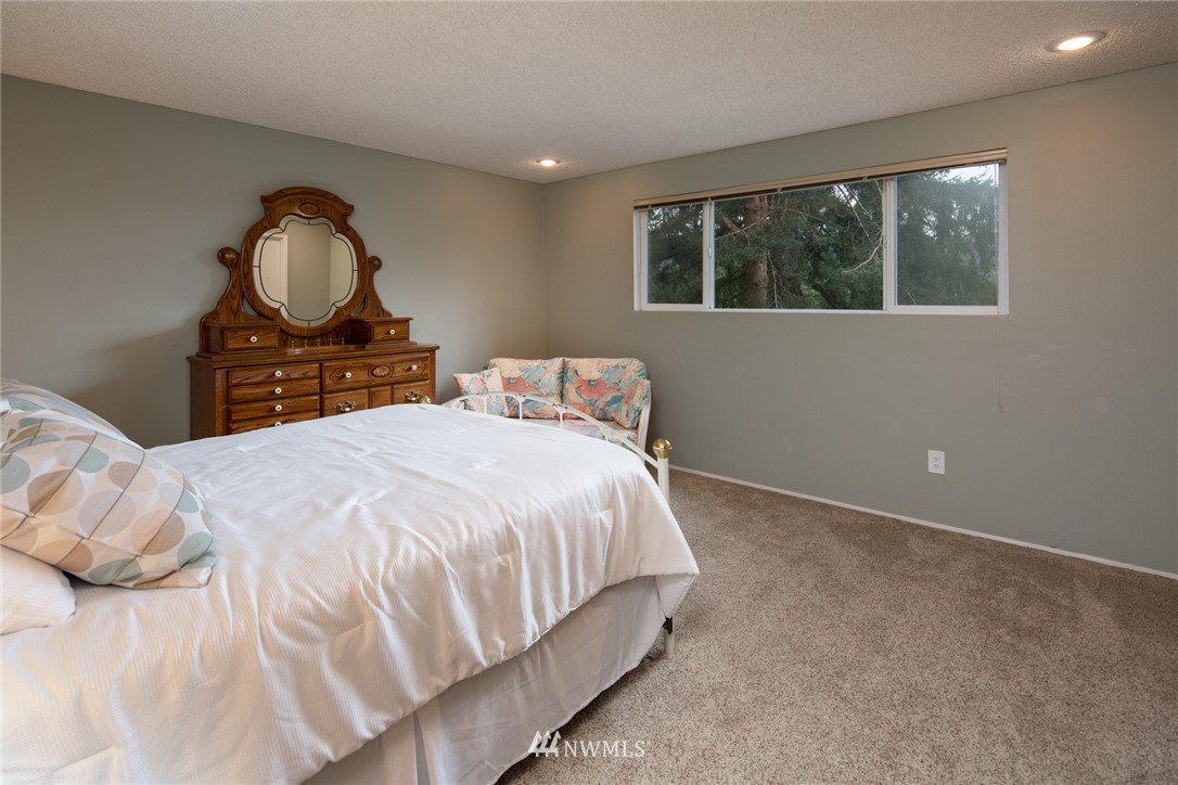 3 Barn View Drive, Unit 5 Bellingham, WA 98229 - Photo 15 of 25 a bedroom with a bed and window