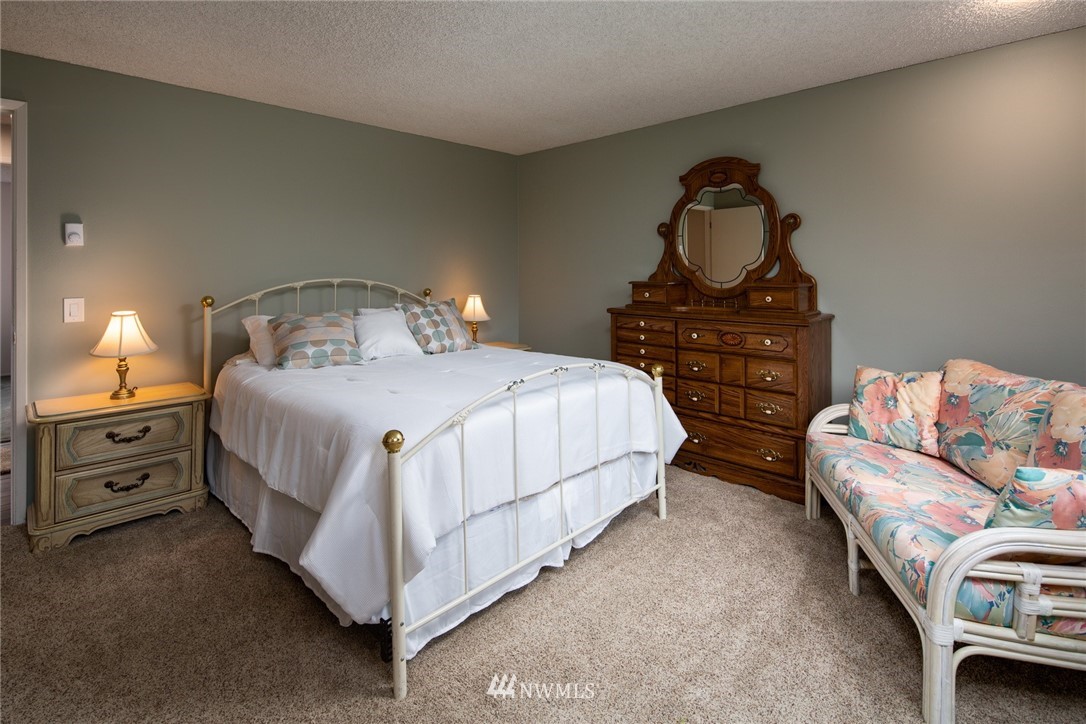3 Barn View Drive, Unit 5 Bellingham, WA 98229 - Photo 16 of 25 a bedroom with a bed and a dresser