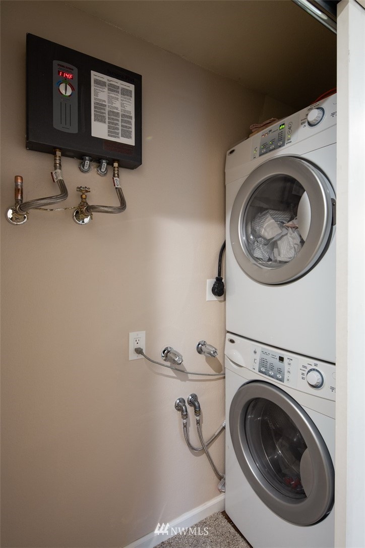 3 Barn View Drive, Unit 5 Bellingham, WA 98229 - Photo 21 of 25 a bathroom with a sink and a washer dryer