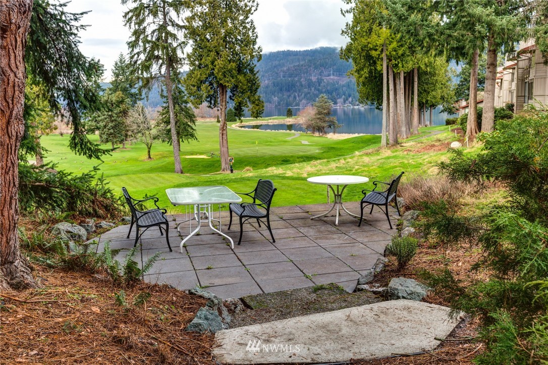 3 Barn View Drive, Unit 5 Bellingham, WA 98229 - Photo 24 of 25 a view of a chairs and table in backyard