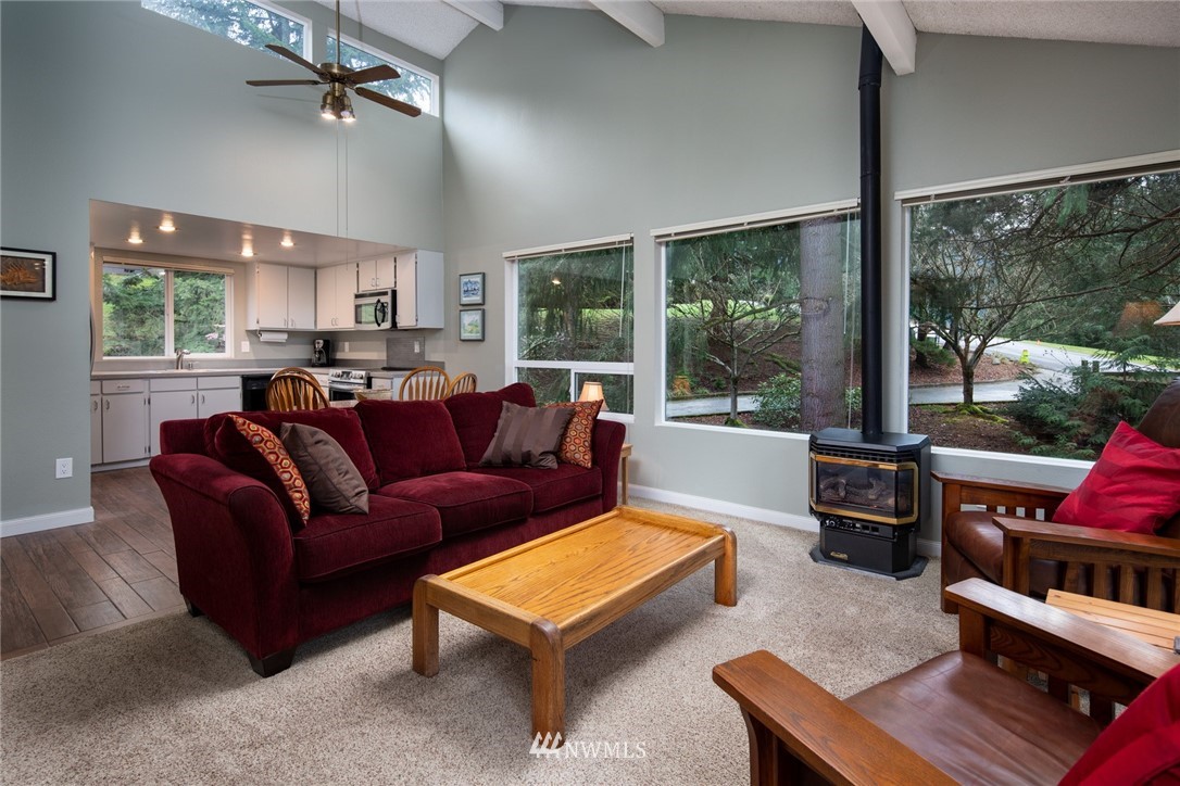 3 Barn View Drive, Unit 5 Bellingham, WA 98229 - Photo 6 of 25 a living room with furniture and a large window