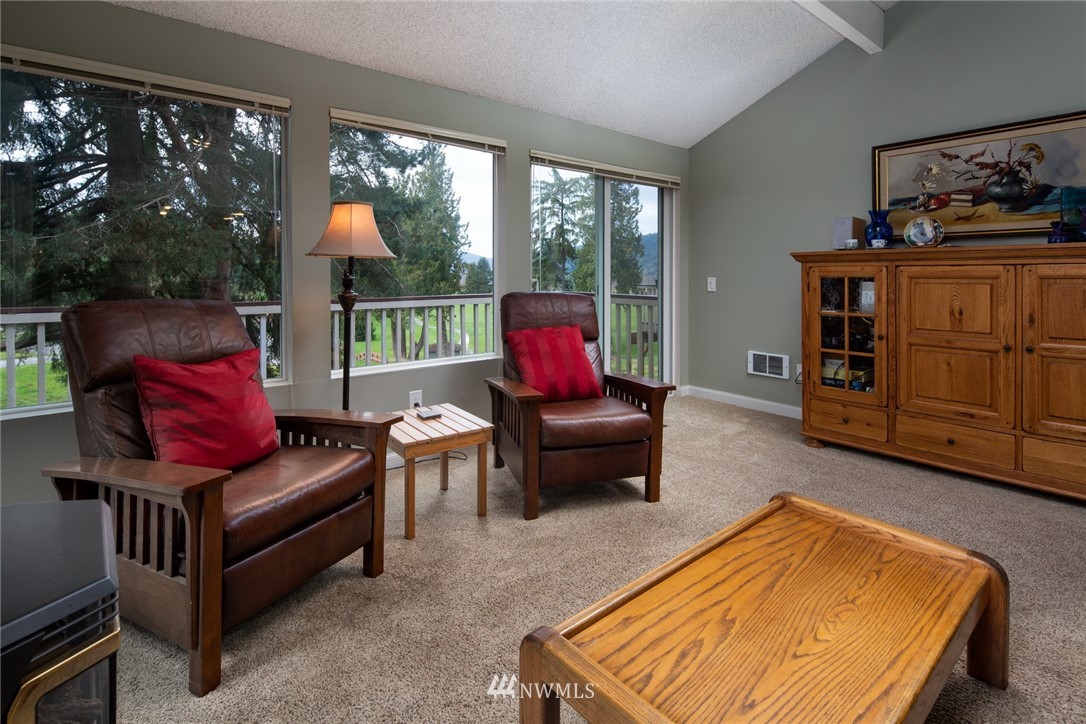 3 Barn View Drive, Unit 5 Bellingham, WA 98229 - Photo 8 of 25 a living room with furniture rug and wooden floor