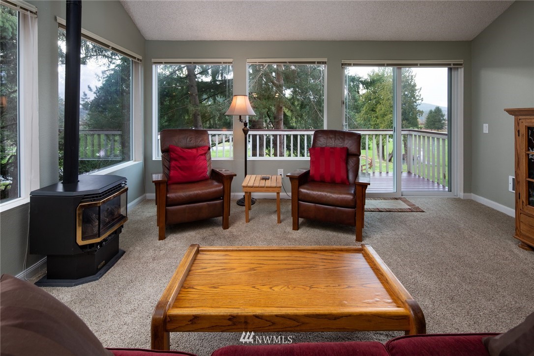 3 Barn View Drive, Unit 5 Bellingham, WA 98229 - Photo 10 of 25 a room with furniture and a flat screen tv