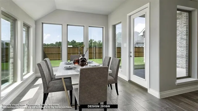 a view of a fountain in front of house with a yard