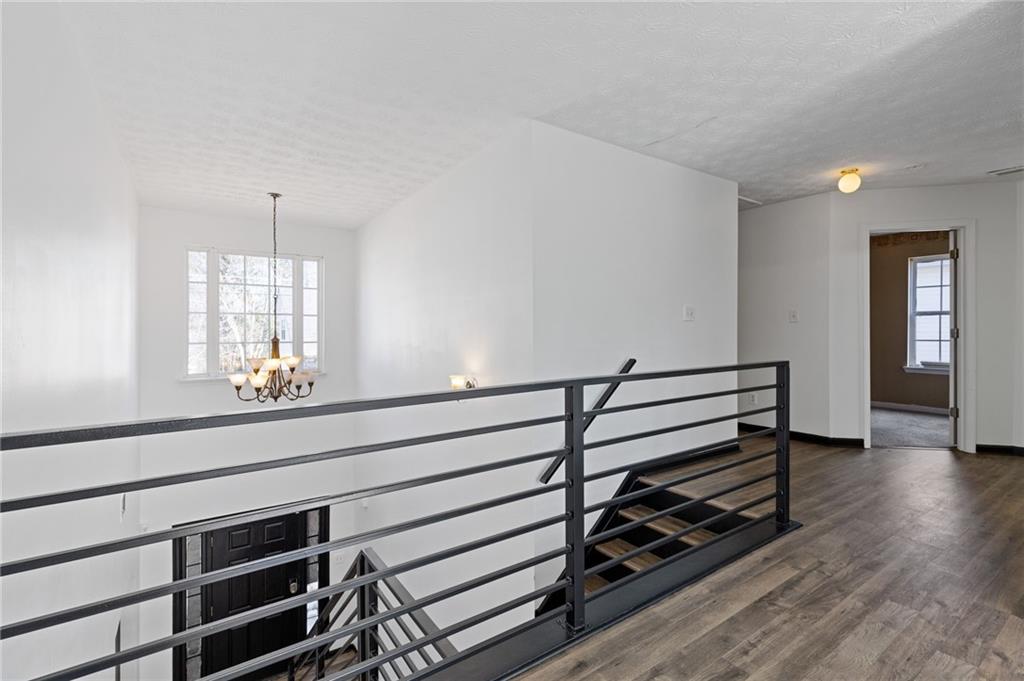 7035 Red Maple Lane Lithonia, GA 30058 - Photo 20 of 37 a view of entryway and hall with wooden floor