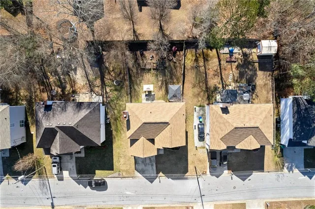 a aerial view of residential houses with outdoor space