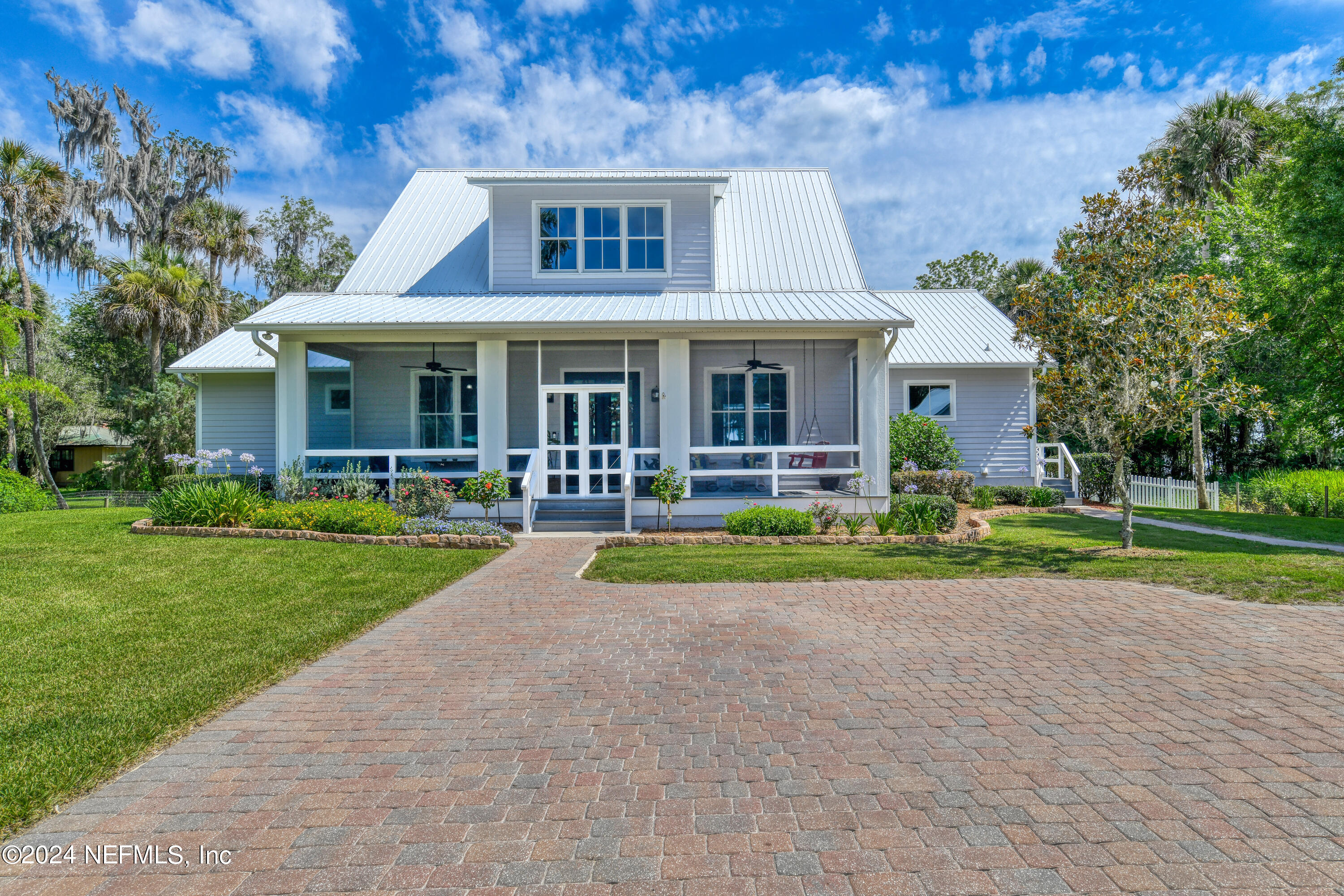 560 Clifton Road Crescent City, FL 32112 - Photo 1 of 73 a front view of house with yard and green space