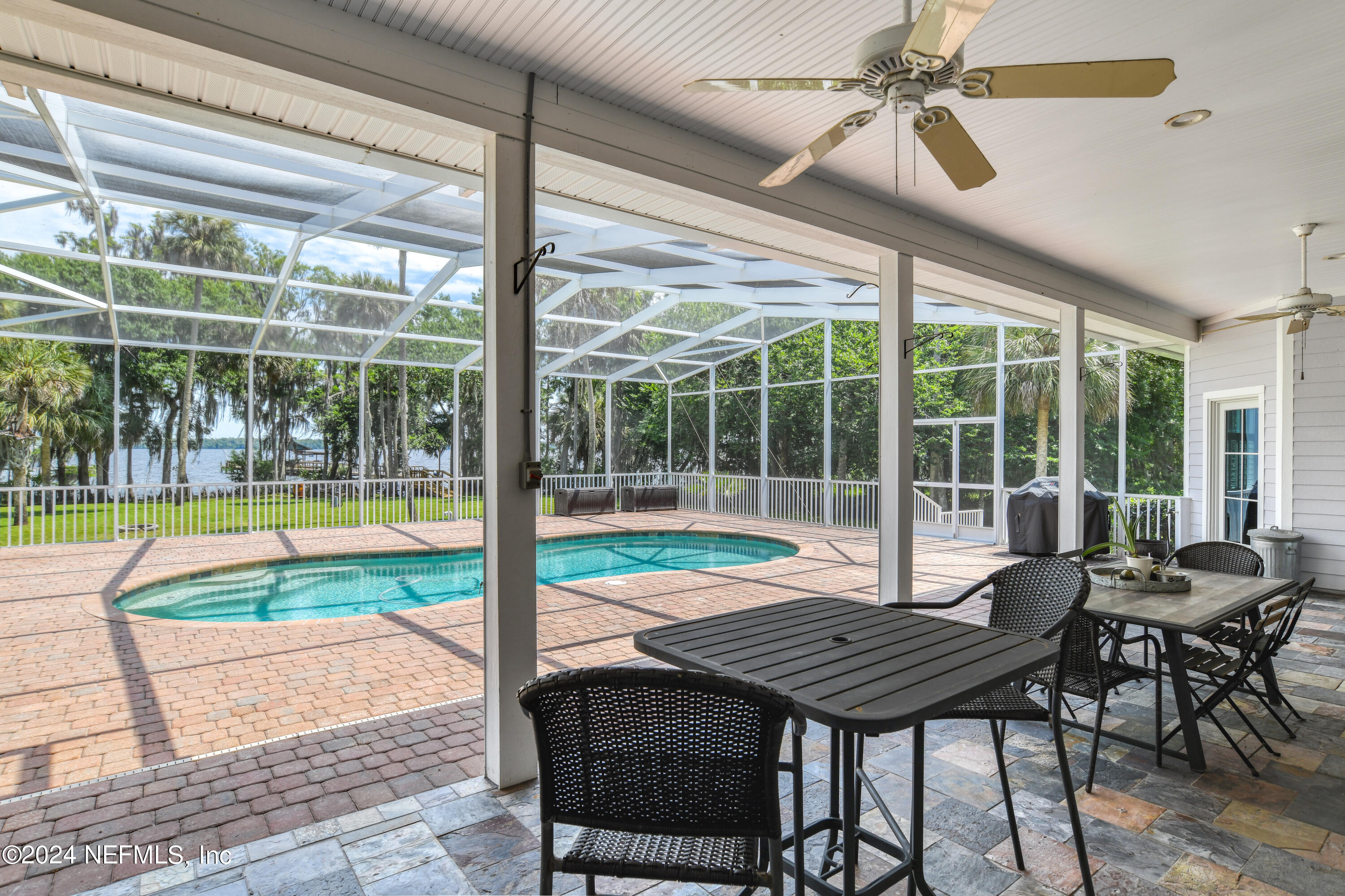 560 Clifton Road Crescent City, FL 32112 - Photo 19 of 73 a view of a dining room with furniture window and outside view