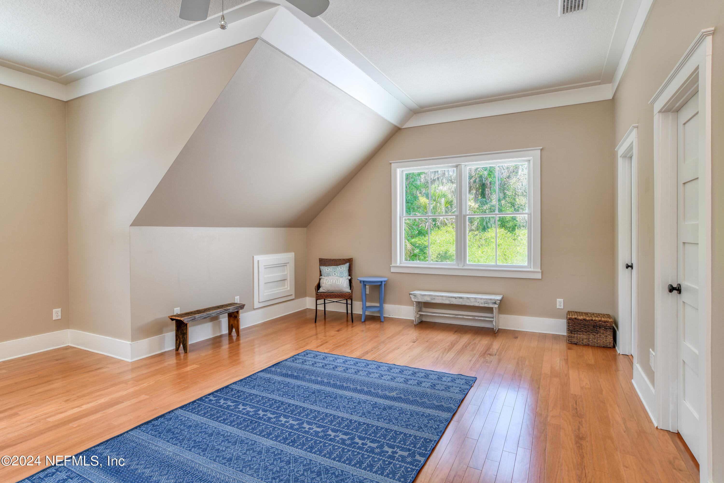 560 Clifton Road Crescent City, FL 32112 - Photo 54 of 73 a living room with furniture and a wooden floor