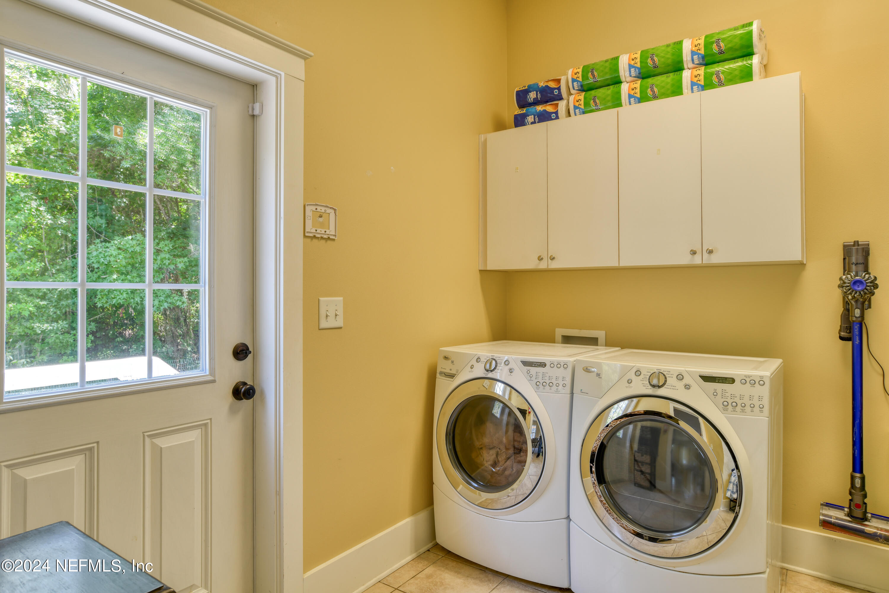560 Clifton Road Crescent City, FL 32112 - Photo 58 of 73 a utility room with dryer and washer