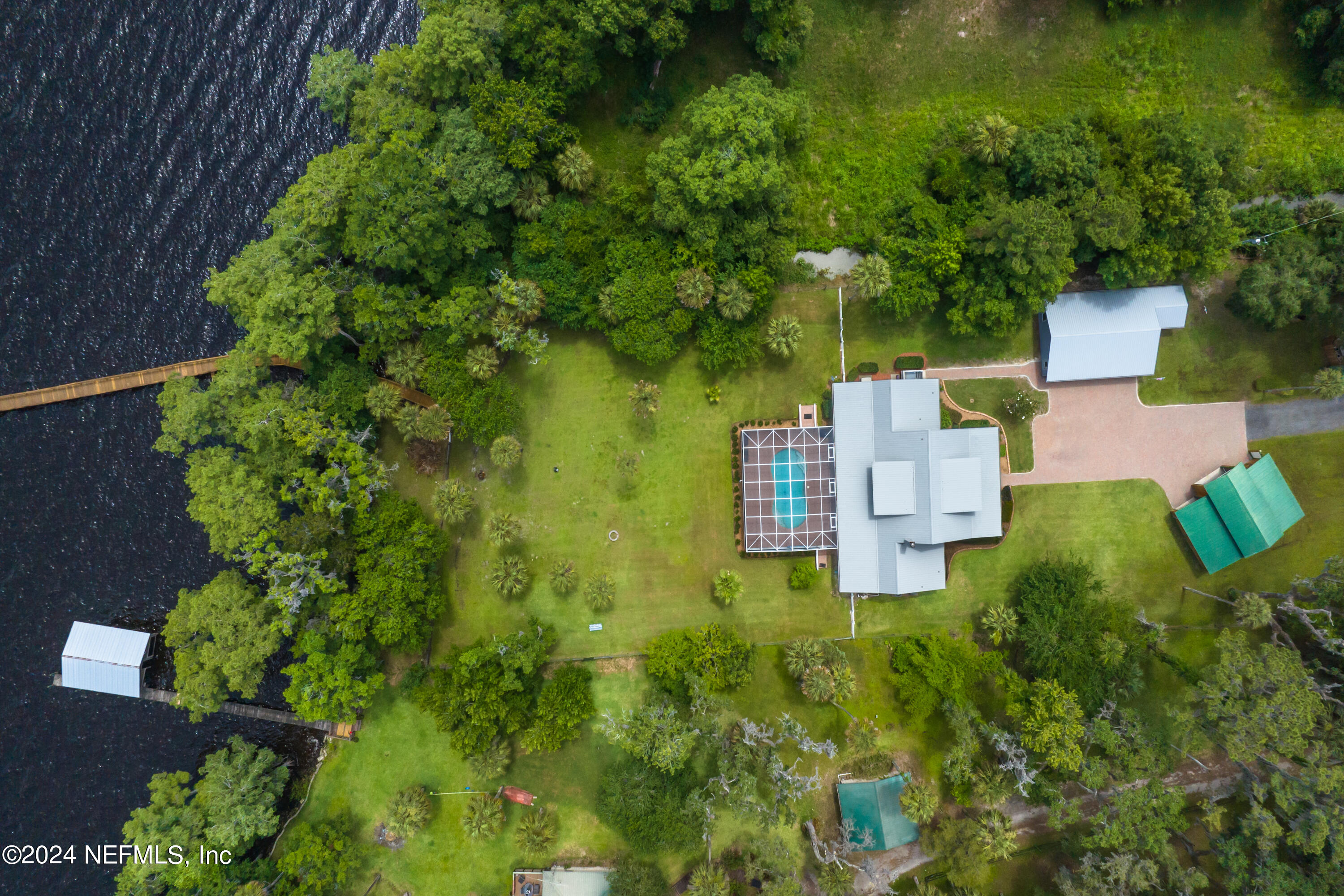 560 Clifton Road Crescent City, FL 32112 - Photo 73 of 73 an aerial view of residential house with outdoor space and trees all around