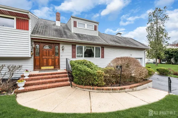a front view of a house with entertaining space