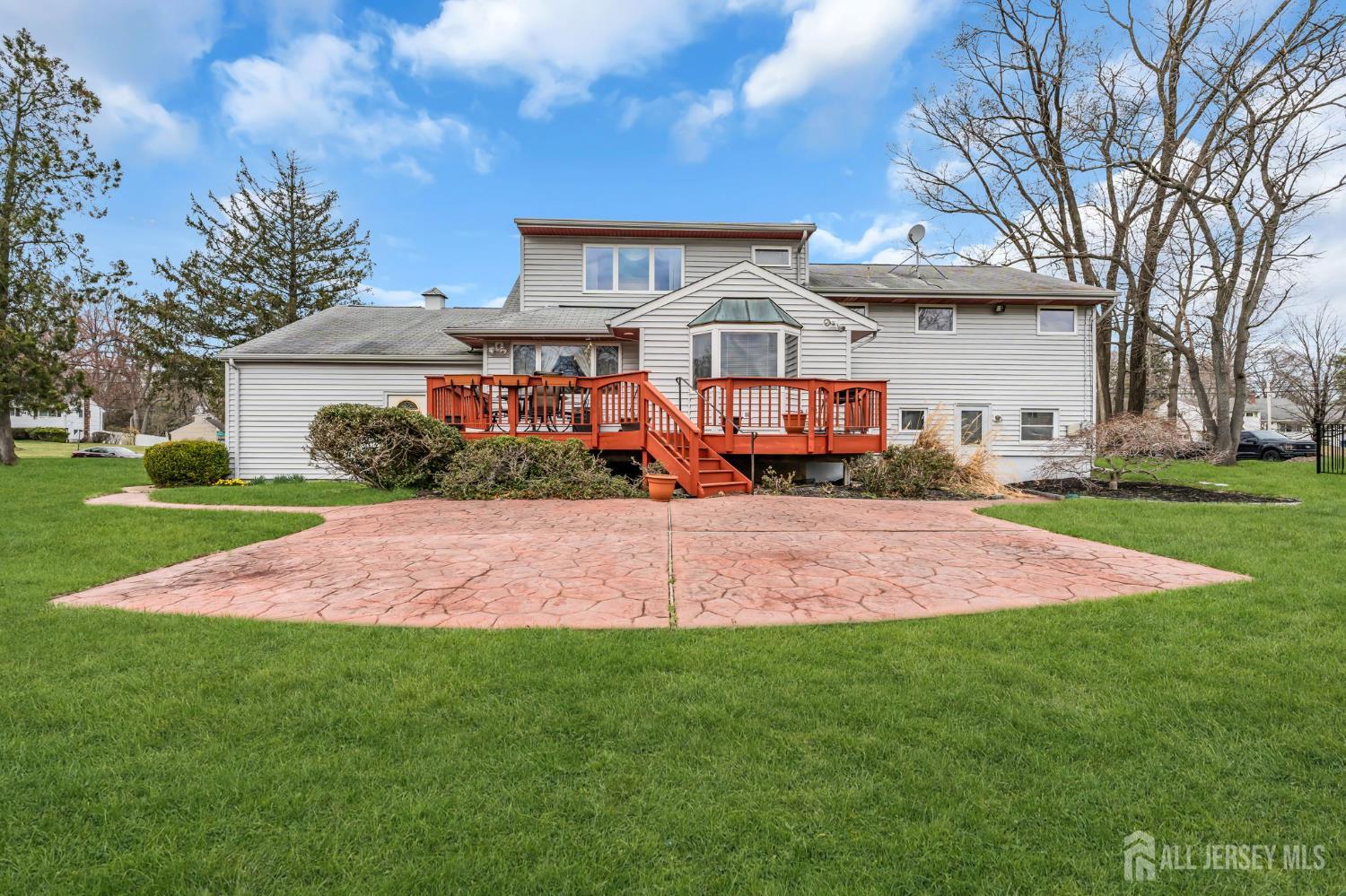 42 Riveredge Road Tinton Falls, NJ 07724 - Photo 38 of 41 a front view of a house with a yard