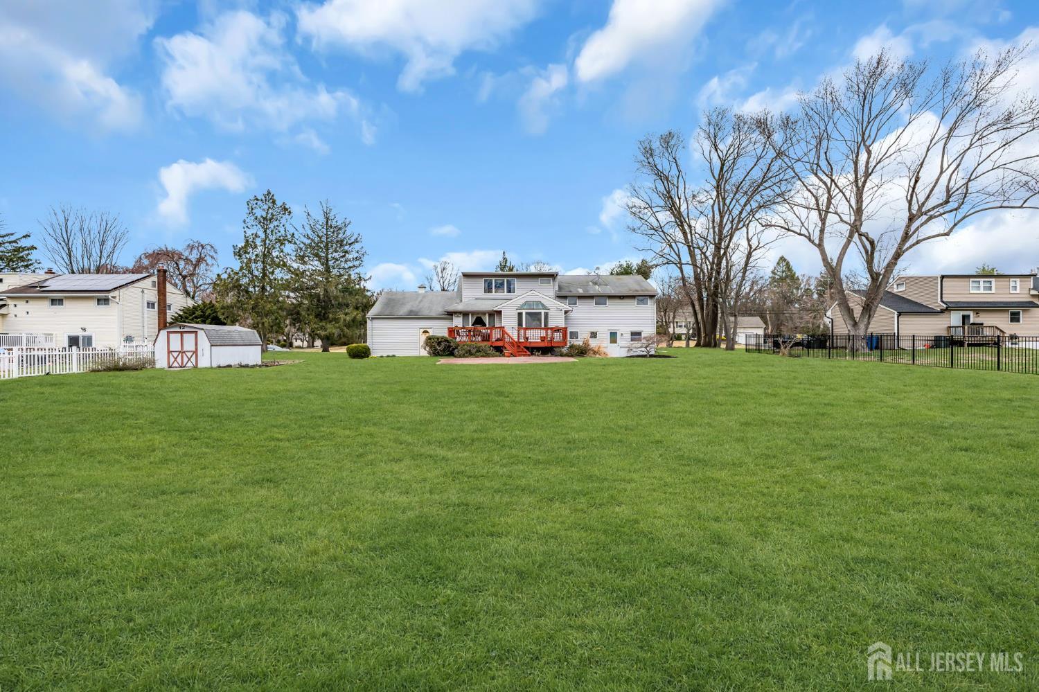 42 Riveredge Road Tinton Falls, NJ 07724 - Photo 40 of 41 a view of a park with large trees