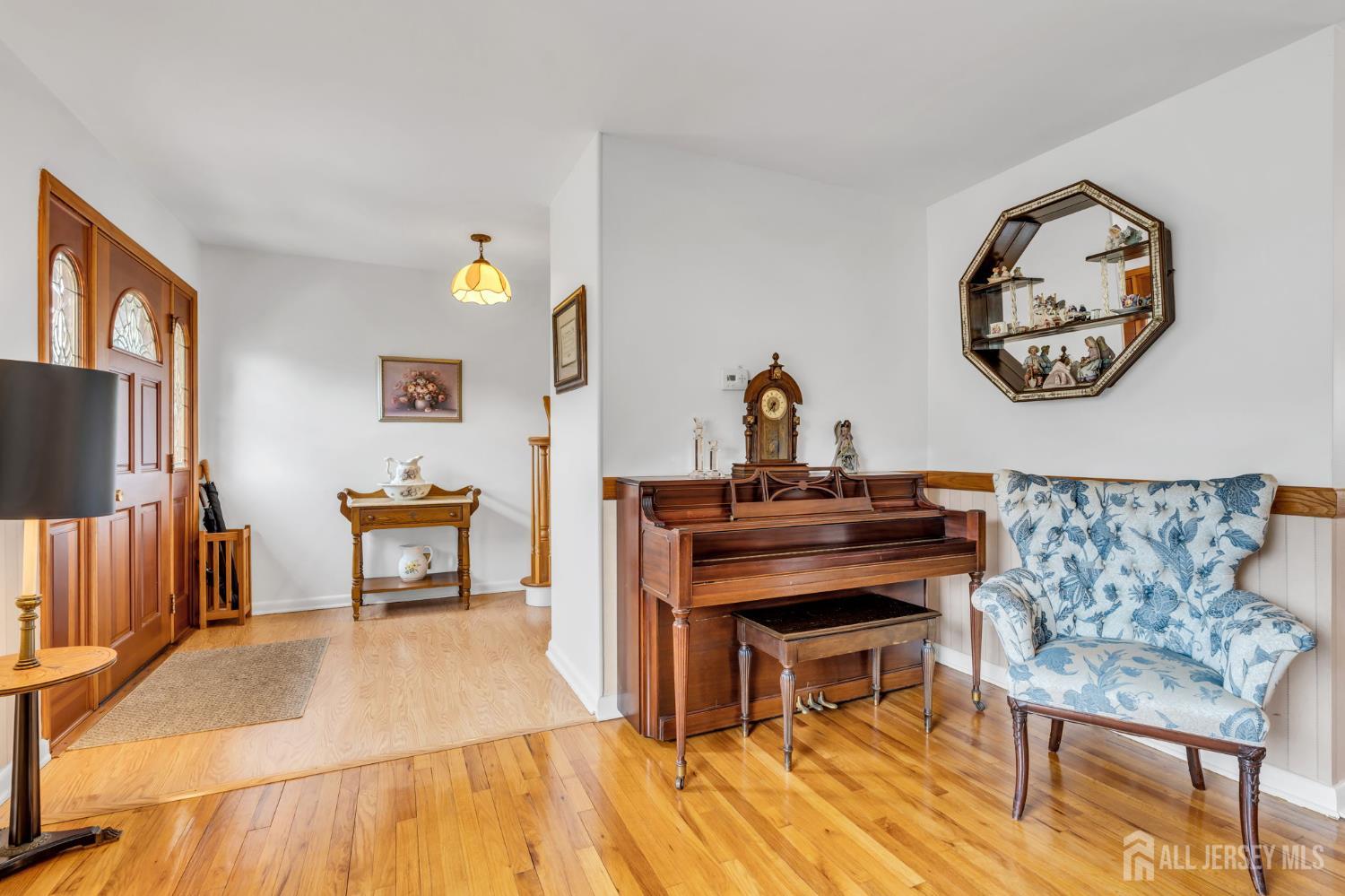 42 Riveredge Road Tinton Falls, NJ 07724 - Photo 5 of 41 a living room with furniture and a piano