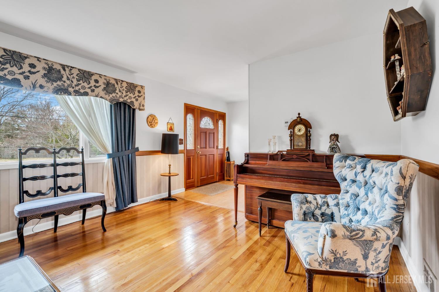 42 Riveredge Road Tinton Falls, NJ 07724 - Photo 6 of 41 a living room with furniture and a piano table
