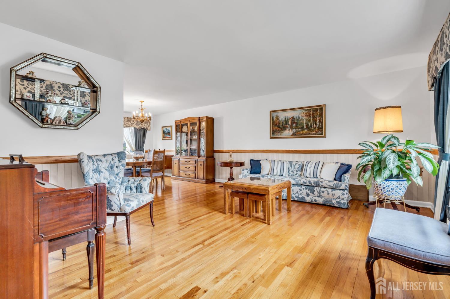 42 Riveredge Road Tinton Falls, NJ 07724 - Photo 8 of 41 a living room with furniture and a wooden floor