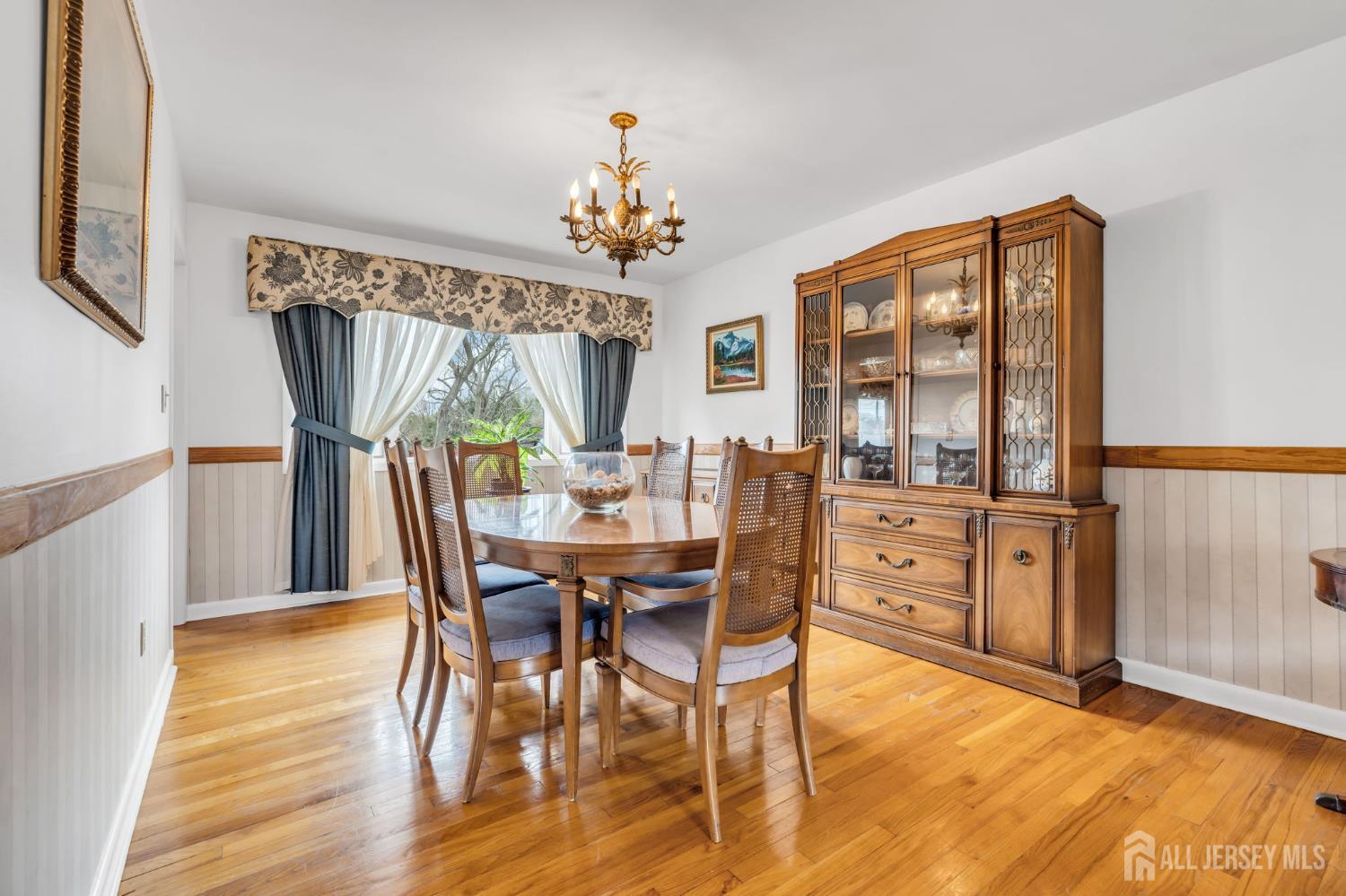 42 Riveredge Road Tinton Falls, NJ 07724 - Photo 10 of 41 a view of a dining room with furniture window and wooden floor
